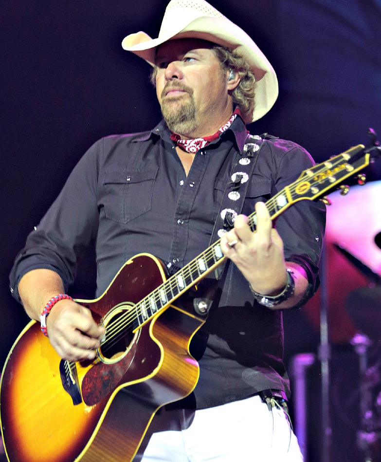 Toby Keith – Kissin’ In The Rain